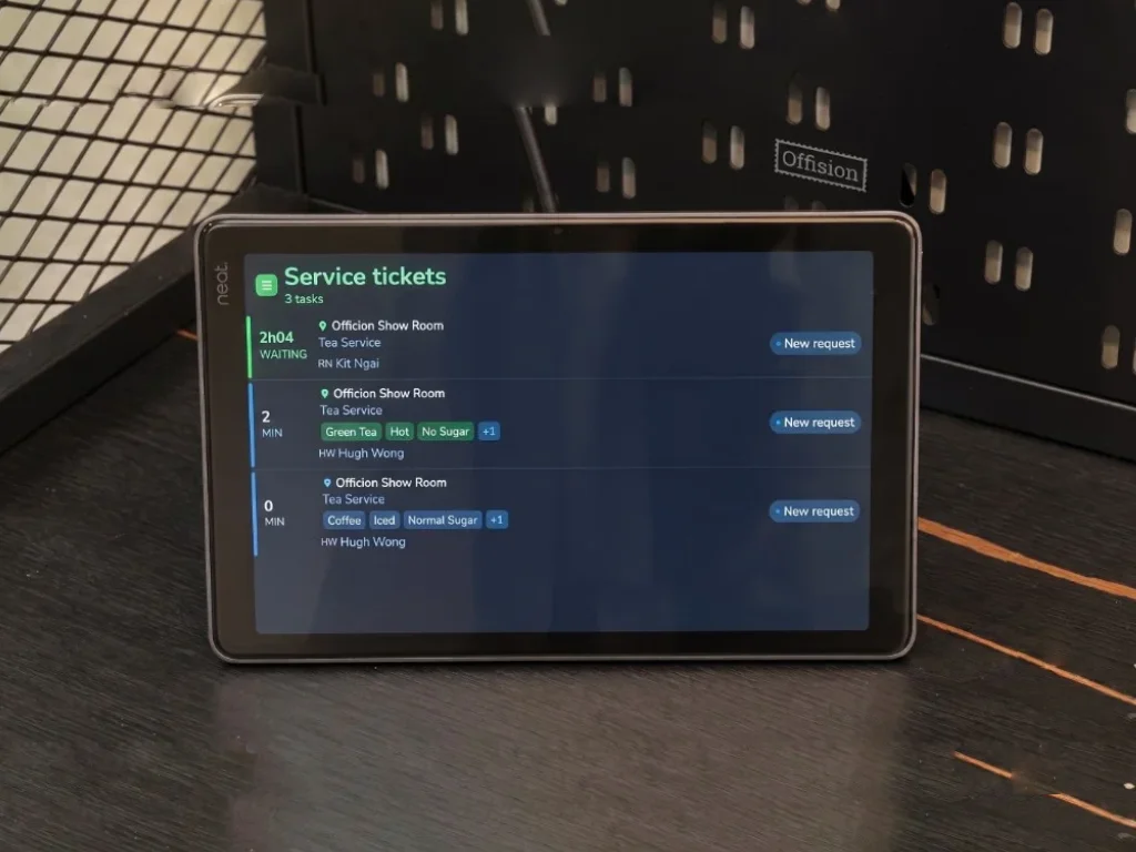 Neat tablet showing Offision service tickets for tea and coffee requests at the Experience Center